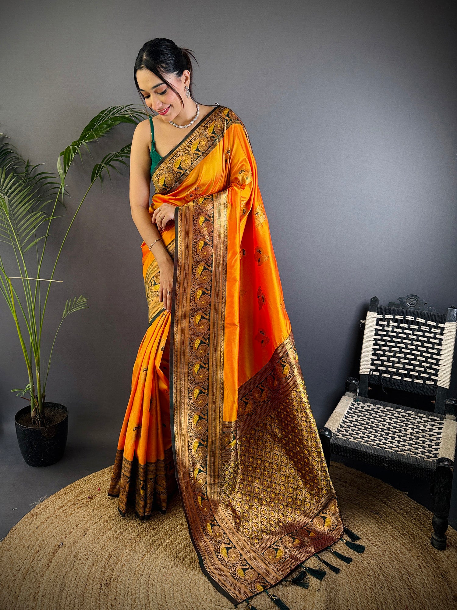 Elora Orange Soft Silk Floral Butta Zari Weaving Banarasi With Peacock Zari Weaving Border