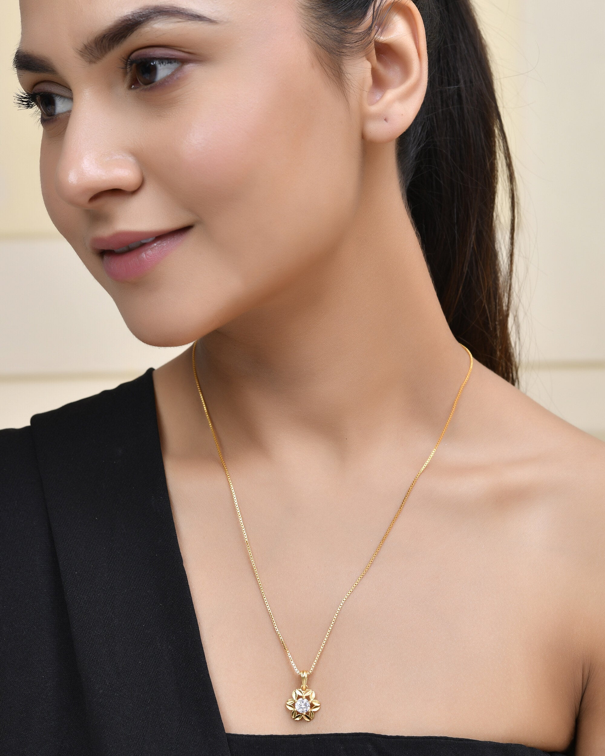 Jewels Nest Elegant Gold-Polished Floral Pendant with Sparkling Stone - Distacart