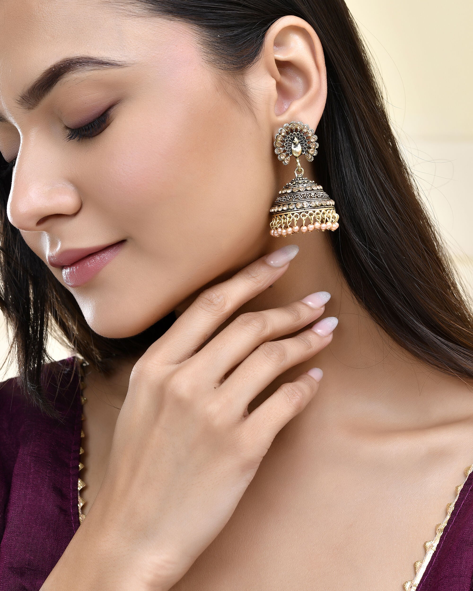 Jewels Nest Antique Gold-Polished Jhumka Earrings with Floral Detailing and Stone Embellishments - Distacart