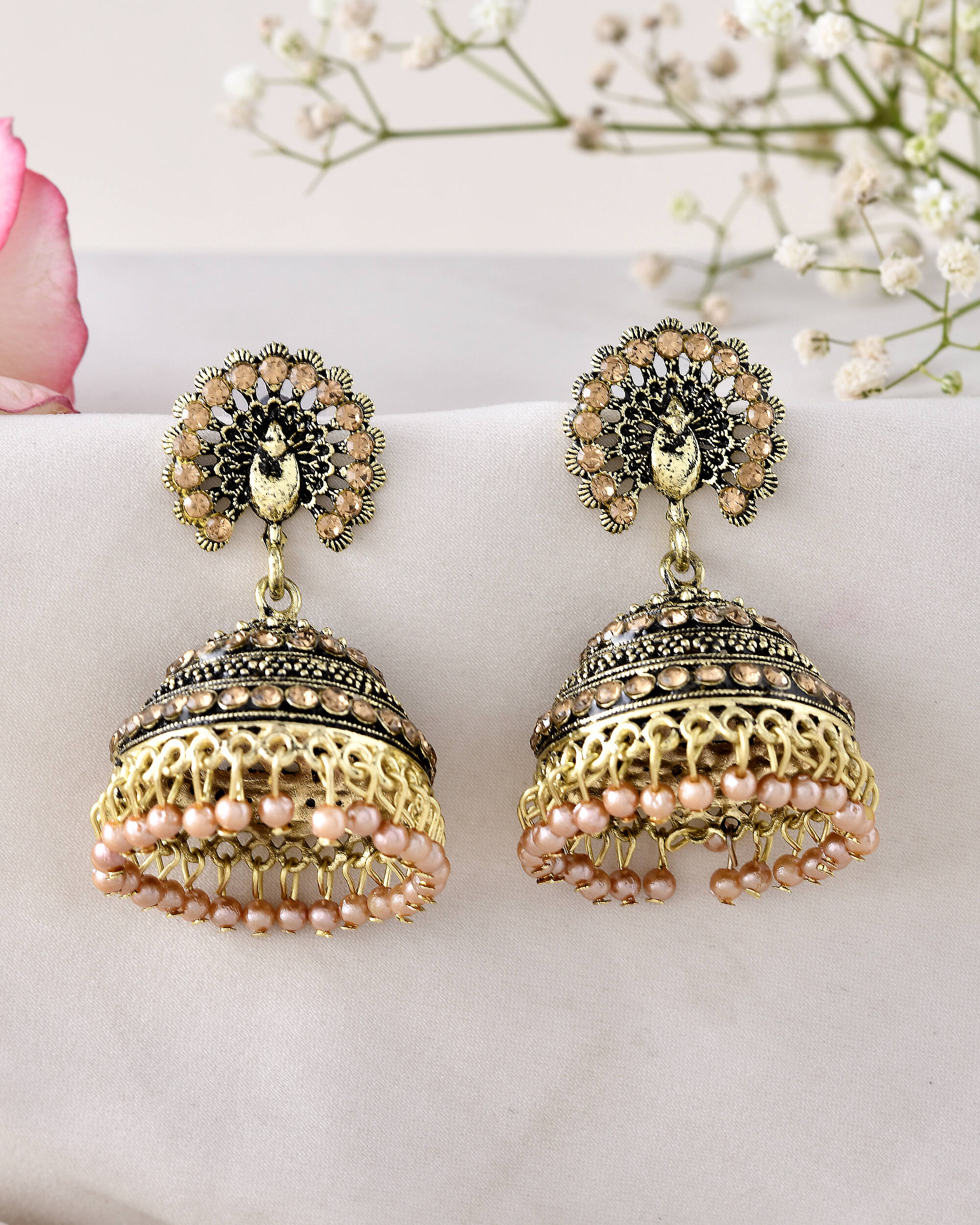 Jewels Nest Antique Gold-Polished Jhumka Earrings with Floral Detailing and Stone Embellishments - Distacart
