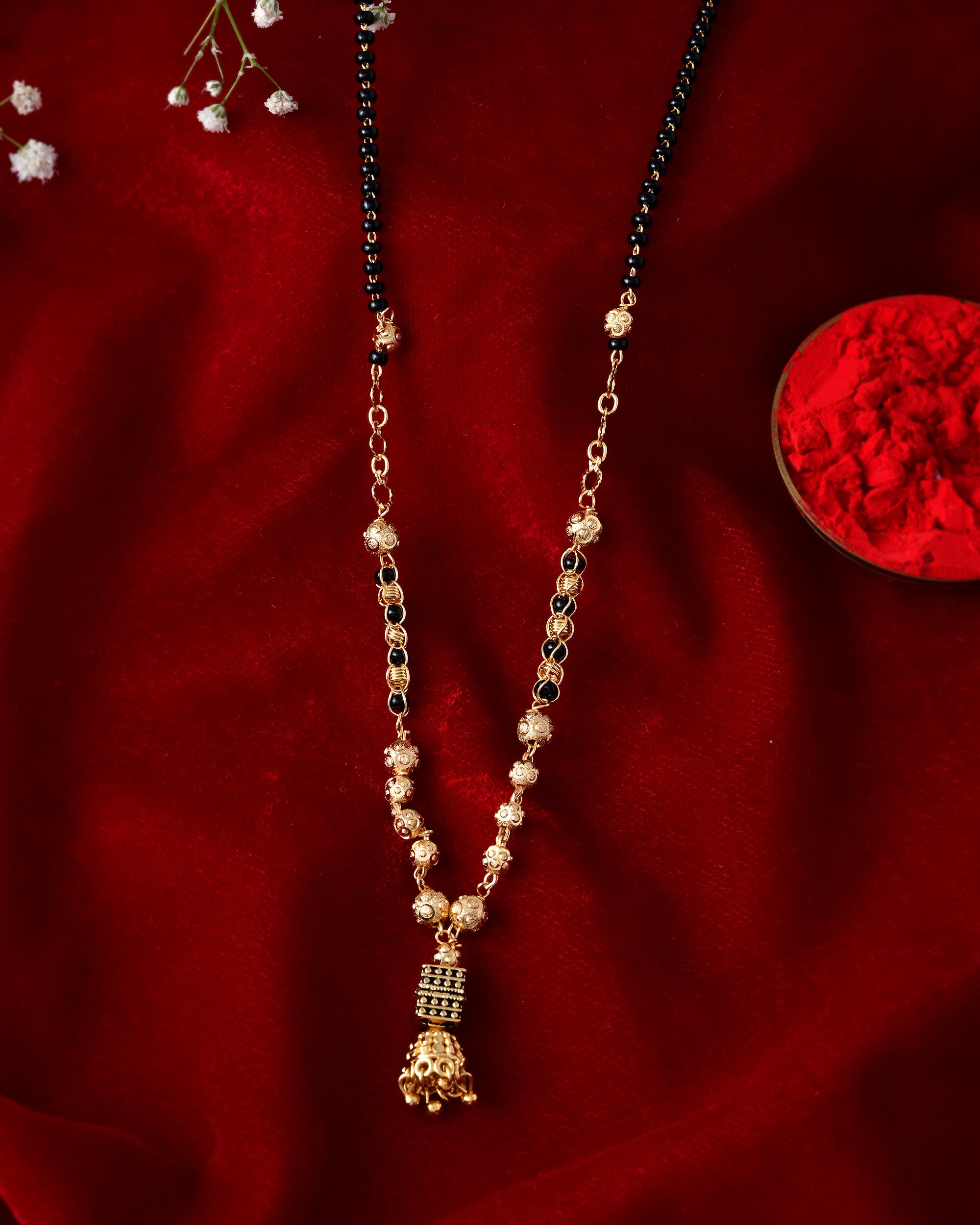Jewels Nest Graceful Gold-Polished Black Bead Mangal Sutra with Intricate Pendant - Distacart