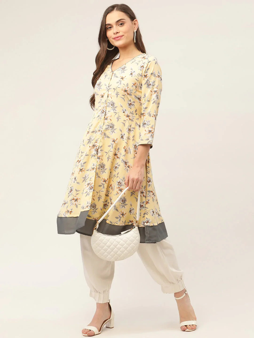 Jompers Women's Yellow and White Flared Printed kurta - Distacart