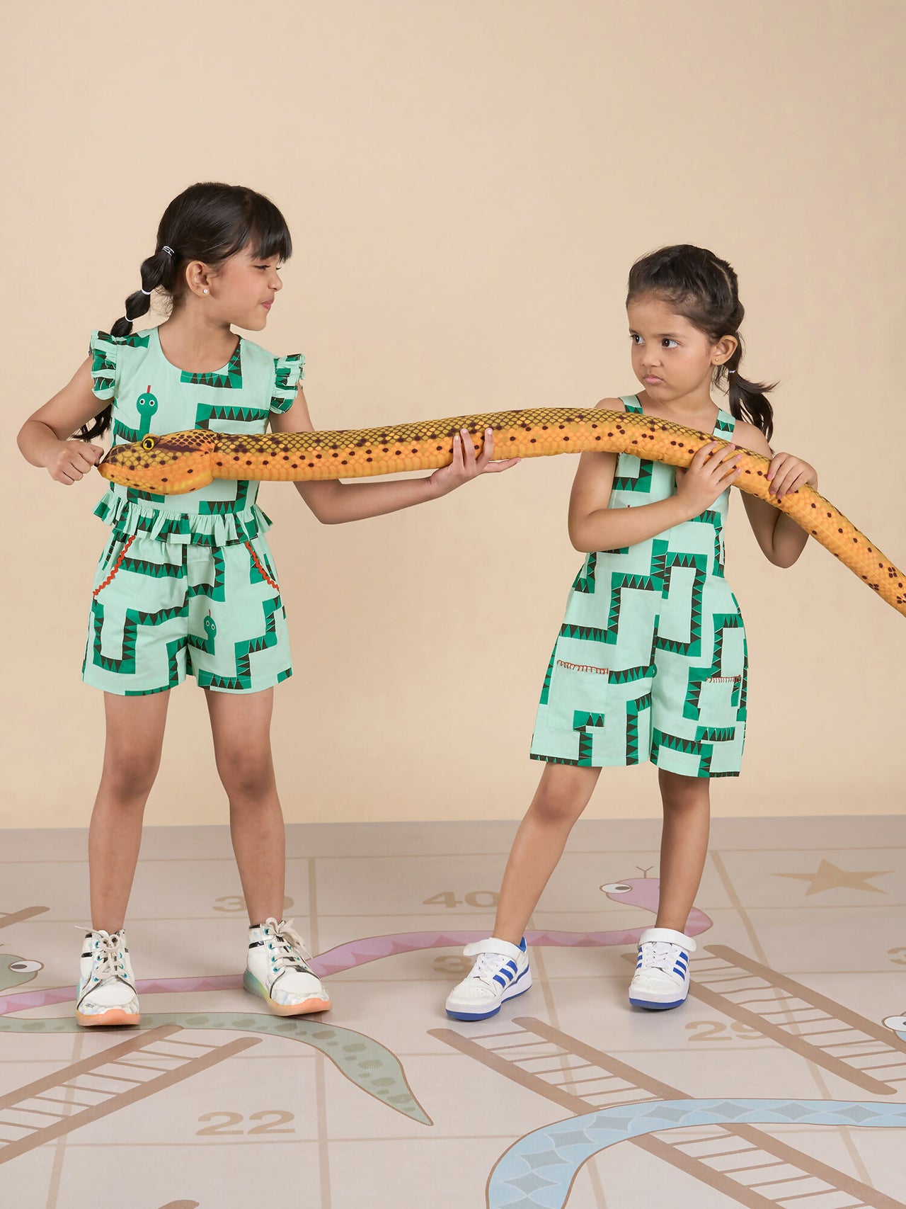 Snakes and Ladders Girls Green Table Print Jumpsuit from Siblings Collection - Distacart