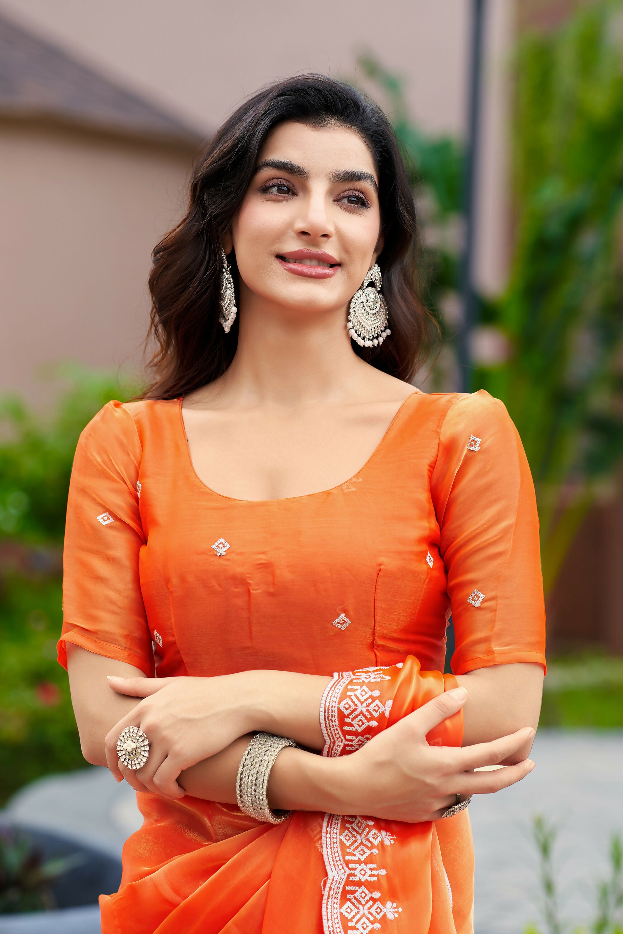 Vastranavya Orange Embroidery Work Shimmer Chiffon Saree with Unstitched Blouse