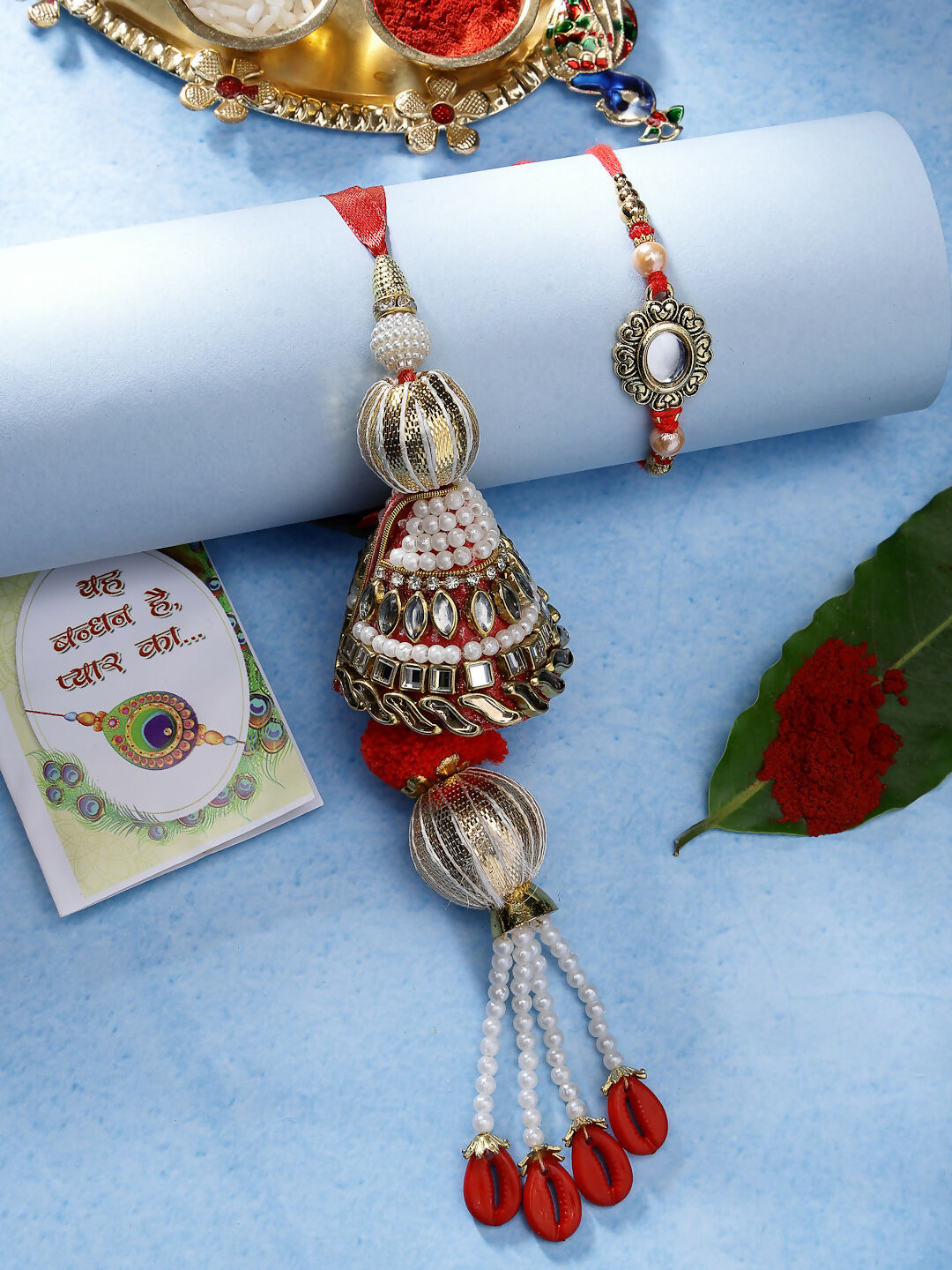 NVR Women & Men Set of 2 Gold & Red Kundan-Studded Bhaiya Bhabhi Rakhi With Roli Chawal & Chocolate - Distacart