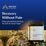 Thumbnail for A jar of Kerala Ayurveda Joint and Tissue Recovery Oil (Murivenna) with a backdrop featuring a natural setting. The label on the jar reads 'Recovery Without Pain' and highlights the product as a deep-penetrating formula for joint & tissue repair.