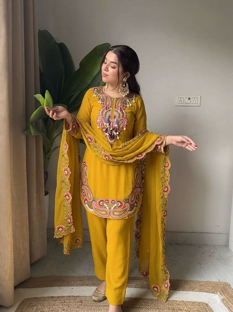 Teeya Creation New Women's Elegant Yellow Straight Cut Suit with Heavy Neckline Embroidery - Dista
