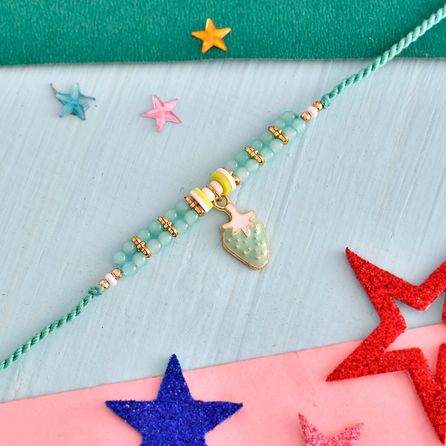 trueBrowns X Voylla Turquoise Beads Kid's Fruit Motif Rakhi For Kids - Distacart