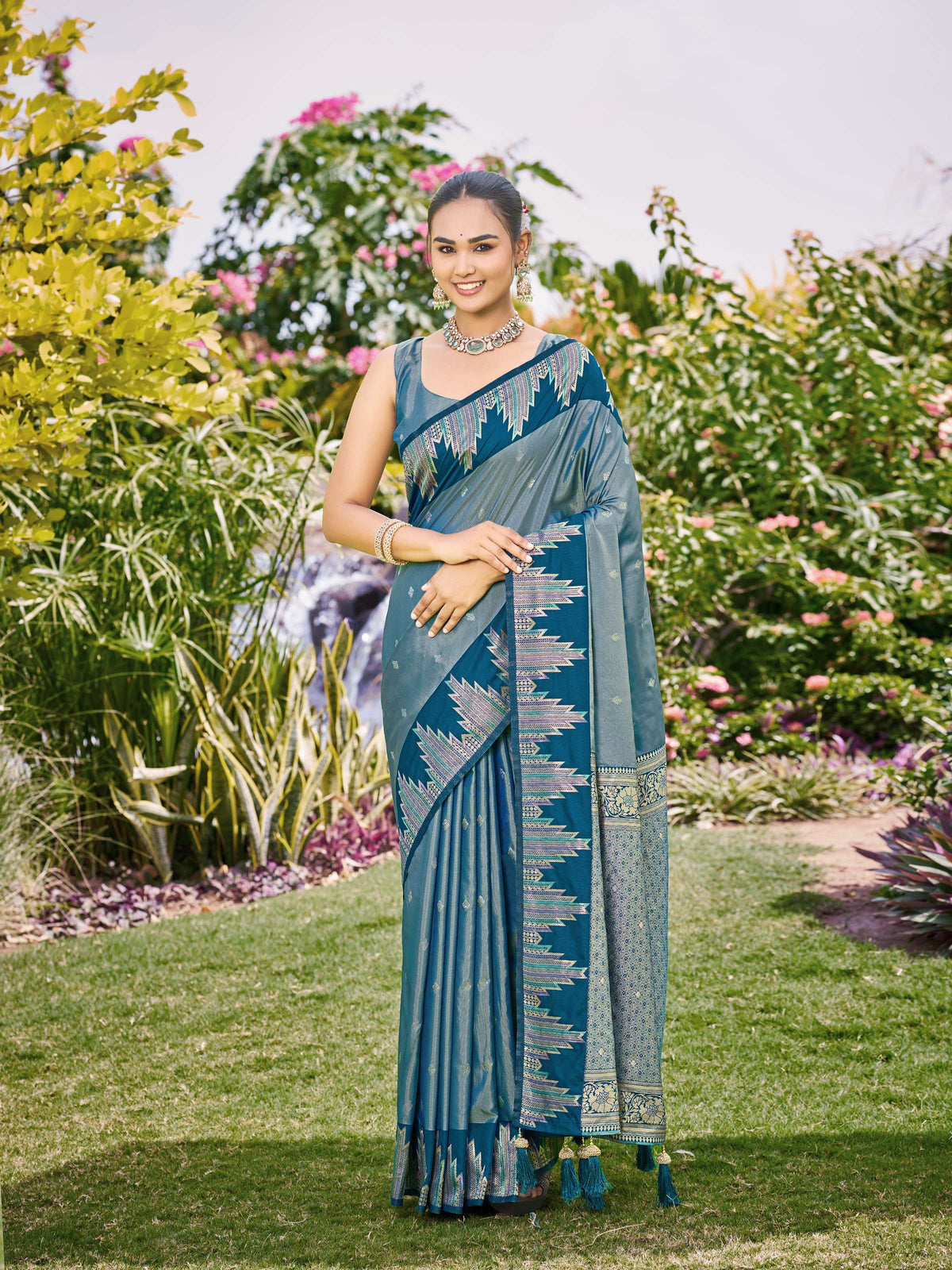 Manohari Women's Teal Blue Silk Blend Banarasi Jacquard Woven Saree with Rich Zari Border, Elegant Tassels & Unstitched Blouse Piece