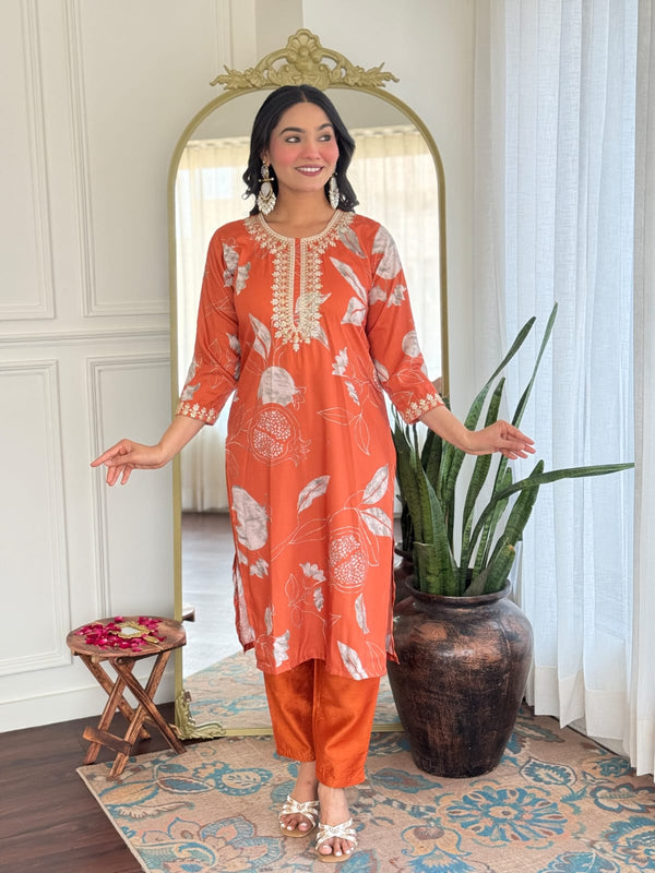 Malishka Women's Orange Muslin Embroidered Straight Kurta With Pant
