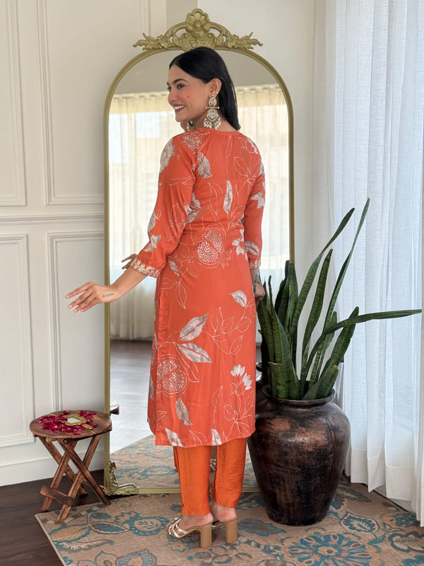Malishka Women's Orange Muslin Embroidered Straight Kurta With Pant
