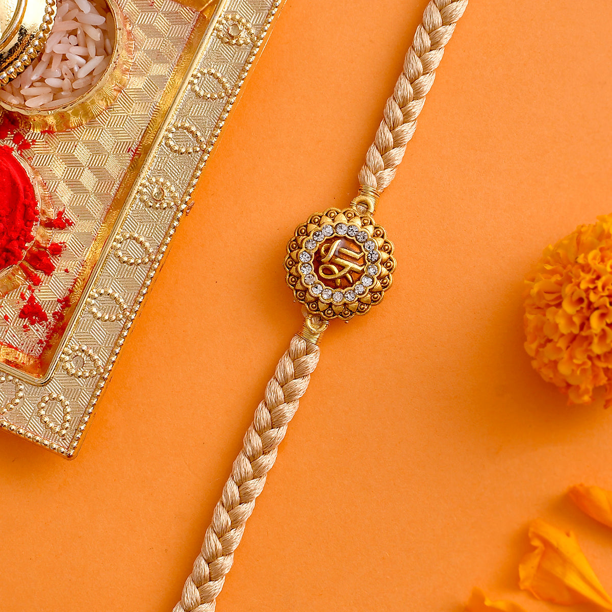 trueBrowns X Voylla Traditional Shree Inscription Zirconia Studded Rakhi - Distacart