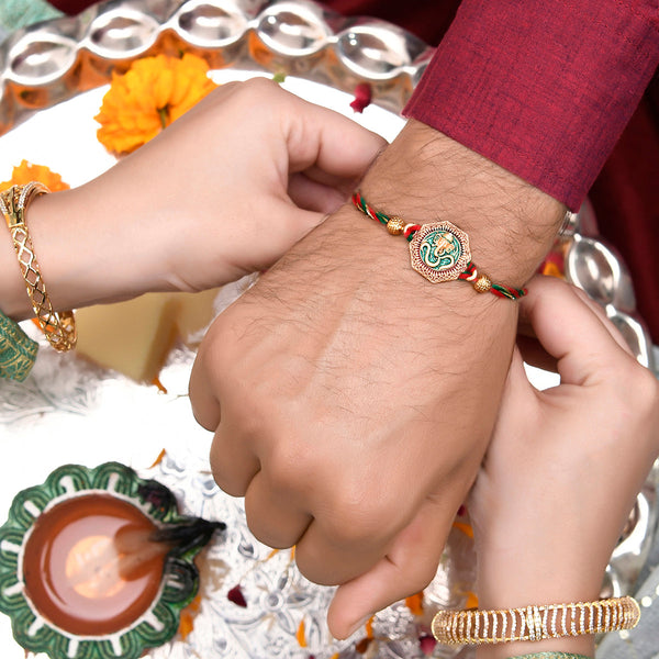trueBrowns X Voylla Traditional Om And Lord Ganesha Motif Thread Rakhi