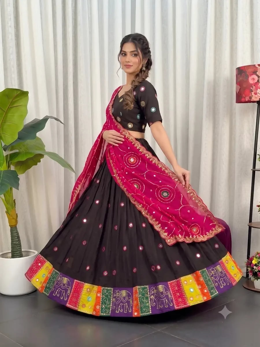 Teeya Creation Traditional Black Navratri Lehenga Choli with Mirror Work and Contrast Rani Pink Dupatta