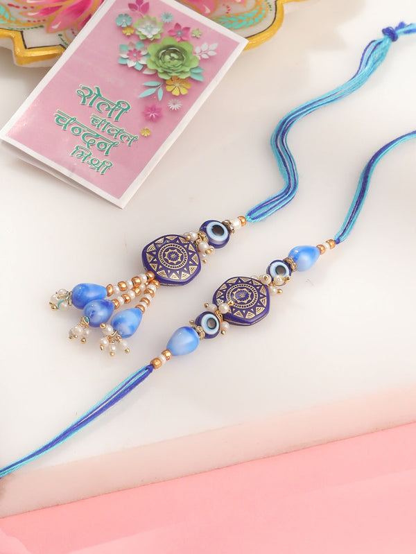 NVR Evil Eye Set of 2 Blue Artificial Beads Bhaiya Bhabhi Rakhi with Roli Chawal Chandan & Mishri