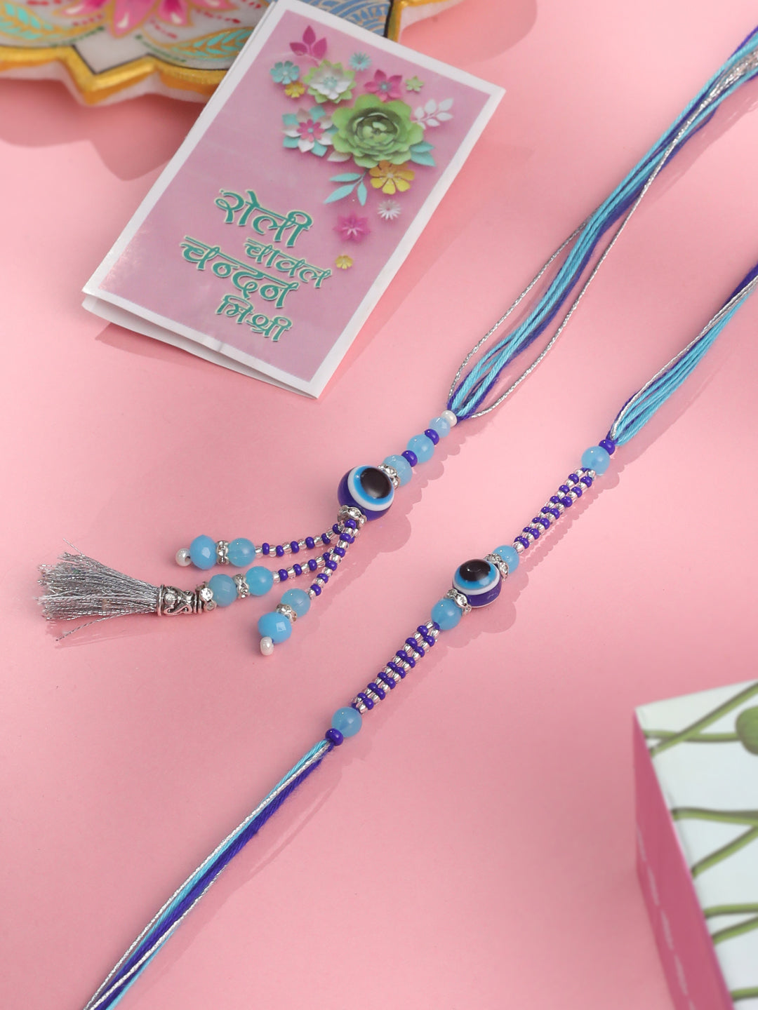 NVR Set of 2 Blue Evil Eye Artificial Beads Bhaiya Bhabhi Rakhi with Roli Chawal Chandan & Mishri - Distacart