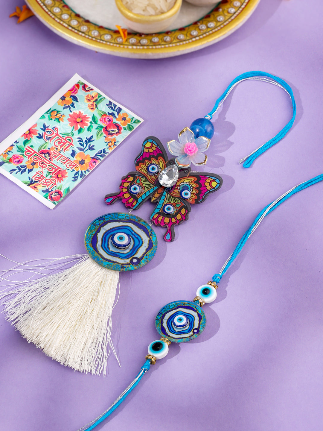 NVR Blue Evil Eye Artificial Beads Set of 2 Bhaiya Bhabhi Rakhi with Roli Chawal Chandan & Mishri - Distacart