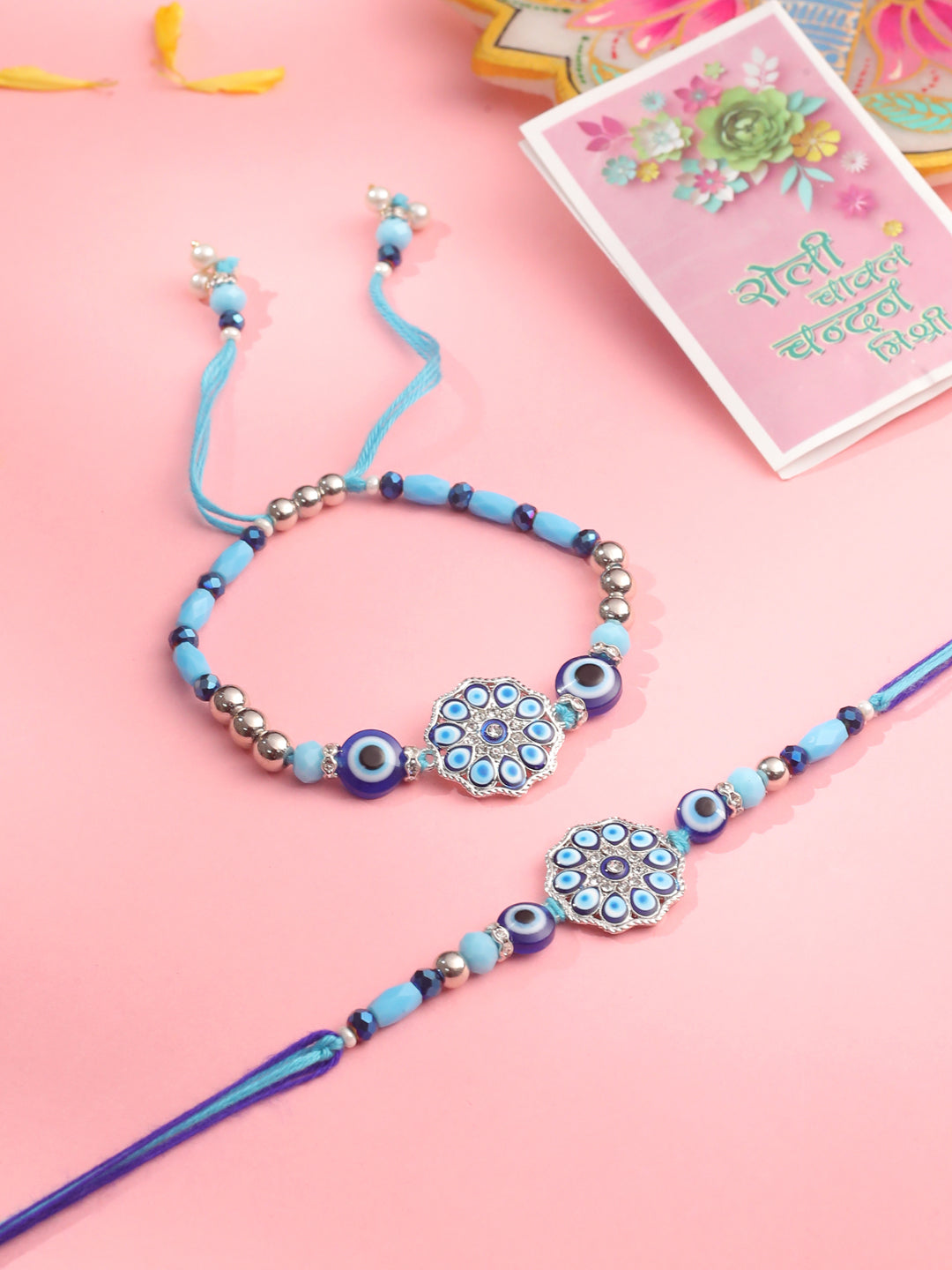 NVR Set of 2 Blue Evil Eye Floral Design Bhaiya Bhabhi Rakhi with Roli Chawal Chandan & Mishri - Distacart