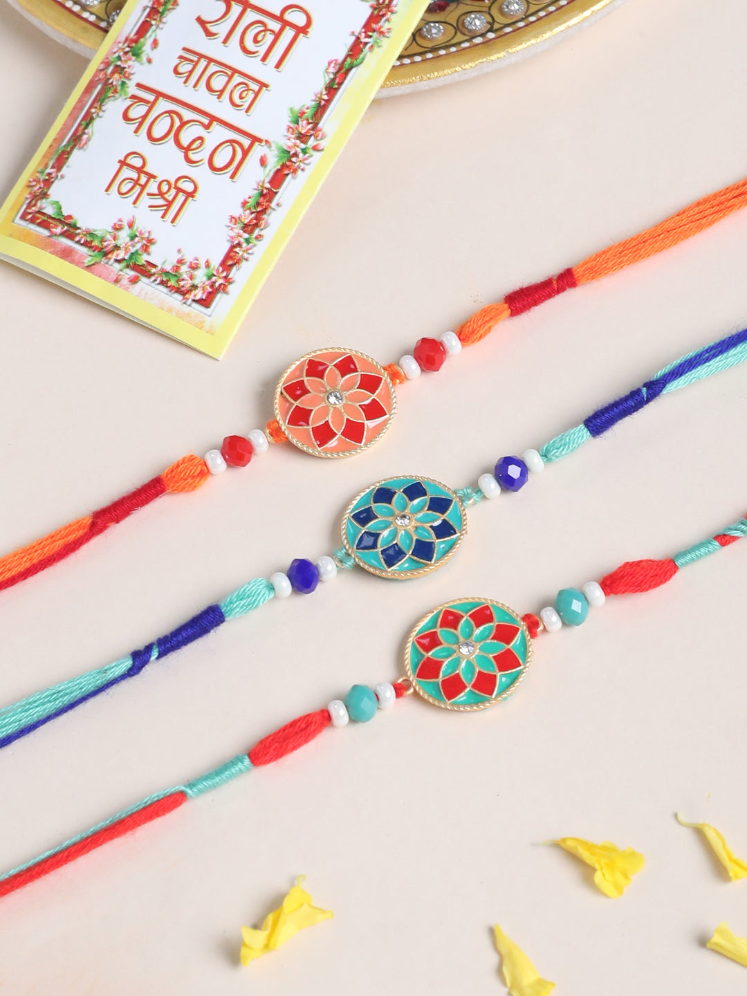 NVR Men Set of 3 Floral Design Multicolor Artificial Beads Thread Rakhi with Roli Chawal Chandan & Mishri - Distacart