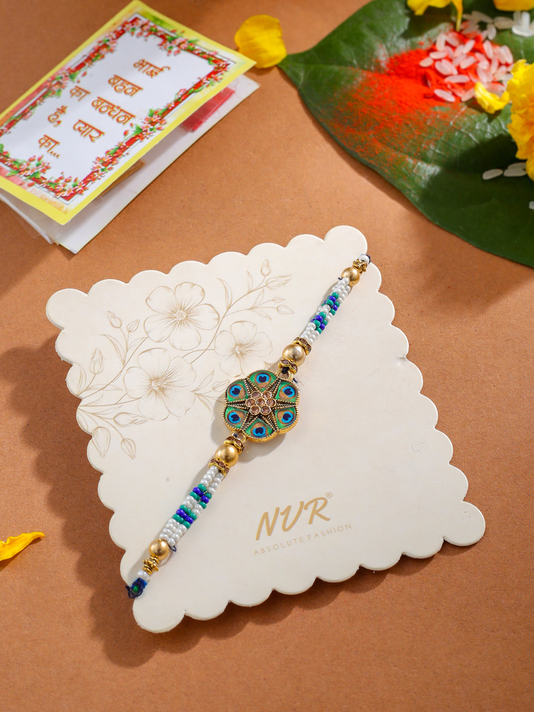 NVR Men Peacock Design Multicolor Artificial Stones & Pearls Thread Rakhi with Roli Chawal Chandan & Mishri - Distacart