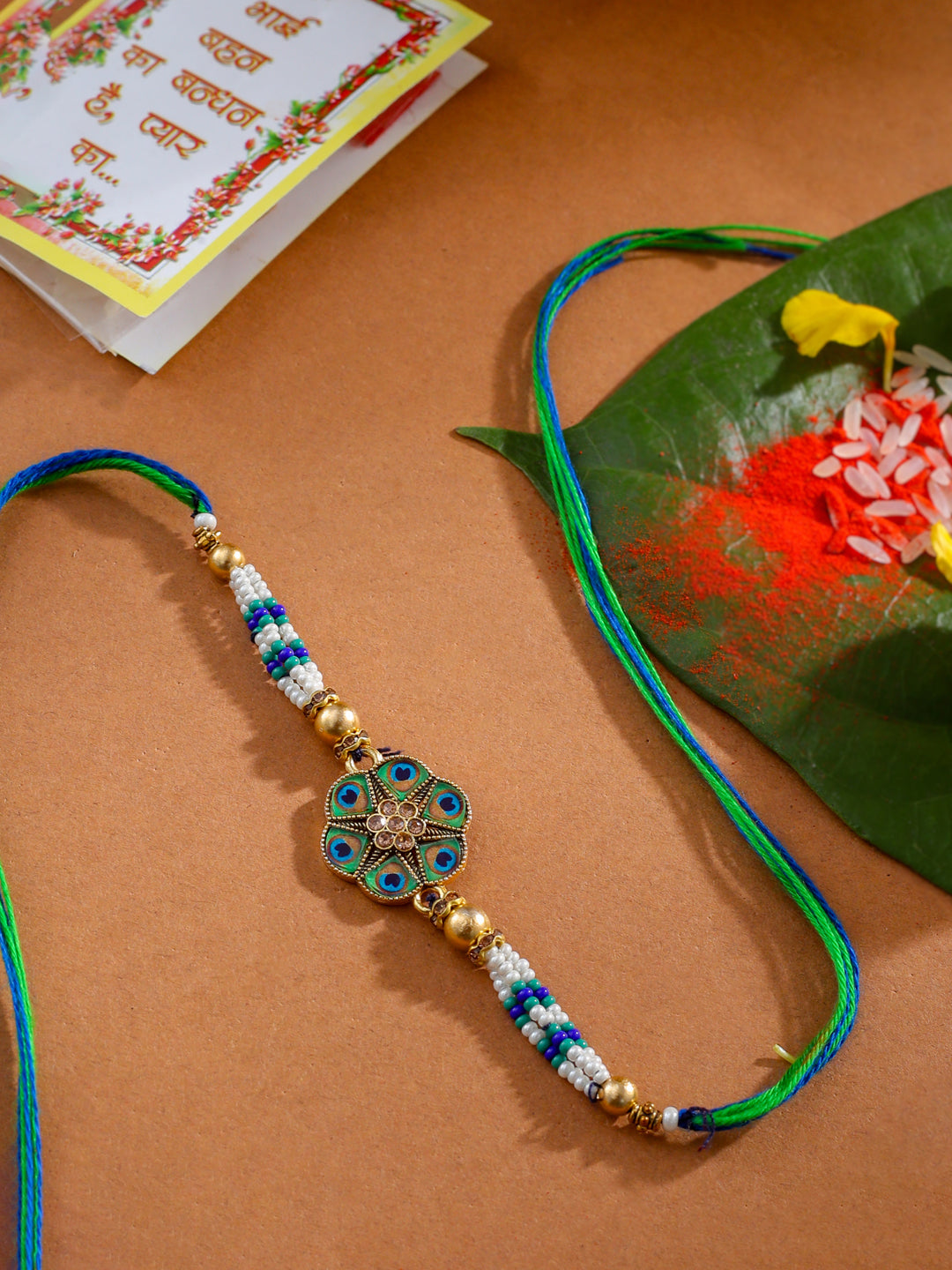 NVR Men Peacock Design Multicolor Artificial Stones & Pearls Thread Rakhi with Roli Chawal Chandan & Mishri - Distacart