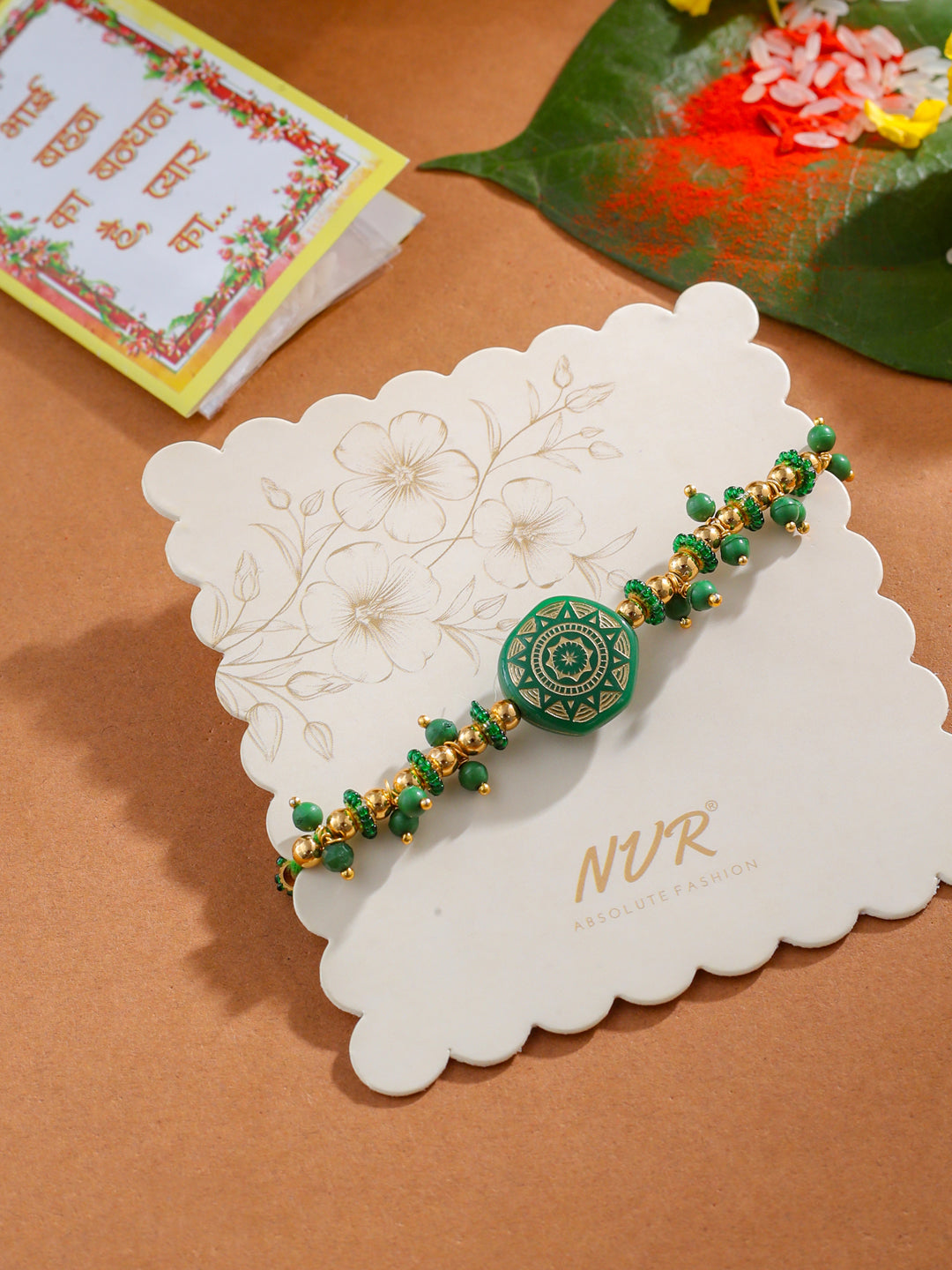 NVR Men Green Artificial Beads Round Shape Thread Rakhi with Roli Chawal Chandan & Mishri - Distacart