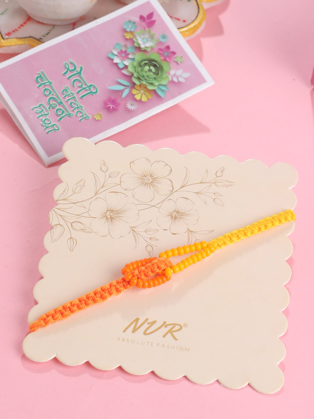 NVR Men's Multicolor Pearls Thread Rakhi with Roli Chawal Chandan & Mishri - Distacart