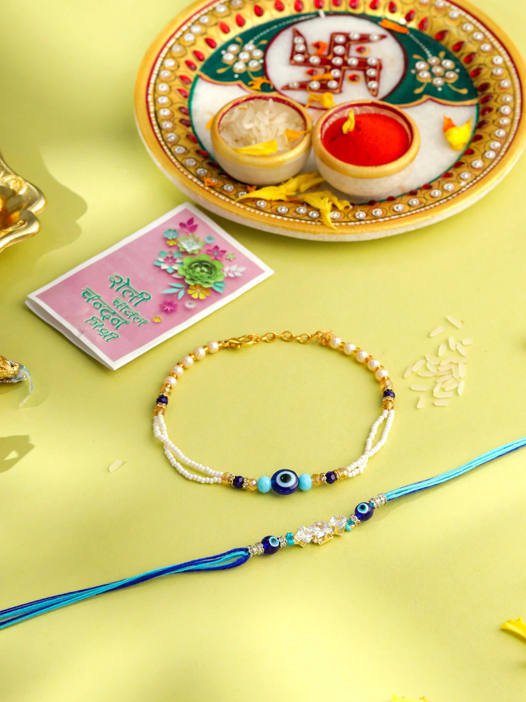 NVR Set of 2 Blue Evil Eye Artificial Stones & Beads Bhaiya Bhabhi Rakhi with Roli Chawal Chandan & Mishri - Distacart