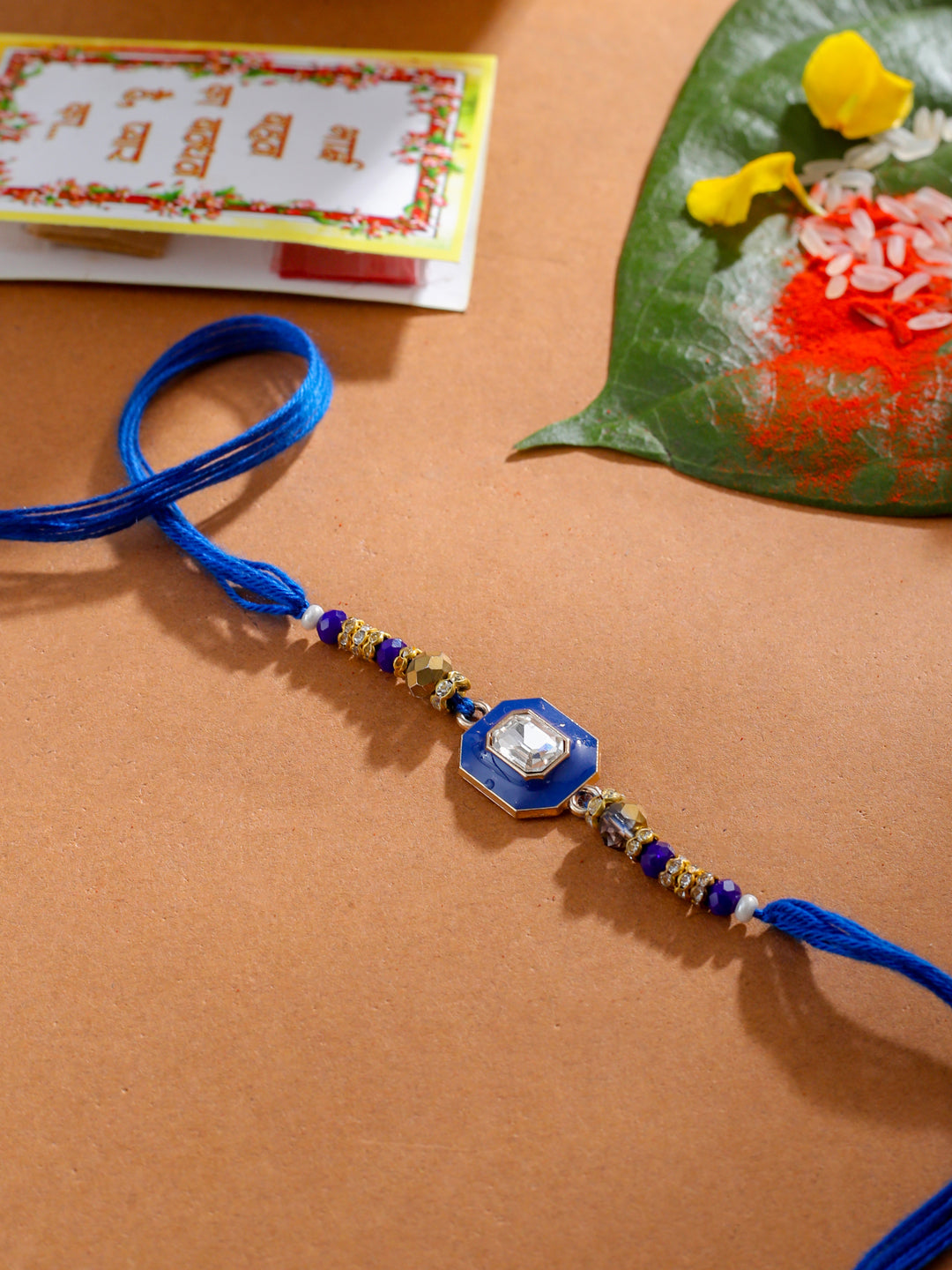 NVR Men Blue Artificial Stones Handmade Thread Rakhi with Roli Chawal Chandan & Mishri - Distacart