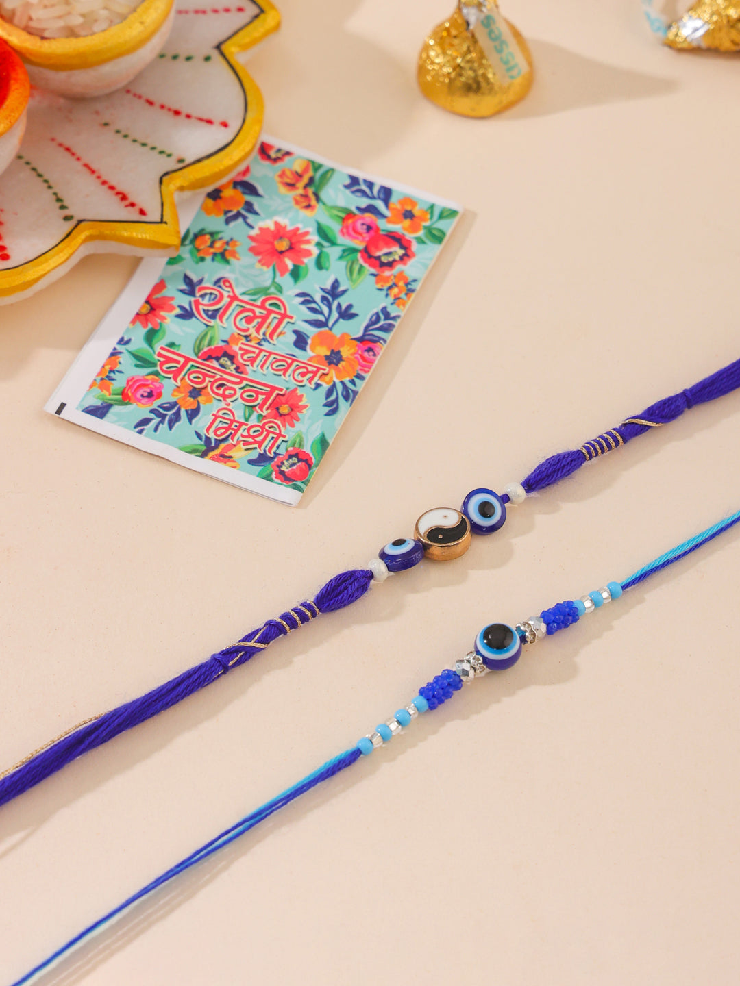 NVR Men Set of 2 Blue Evil Eye Artificial Beads Thread Rakhi with Roli Chawal Chandan & Mishri - Distacart