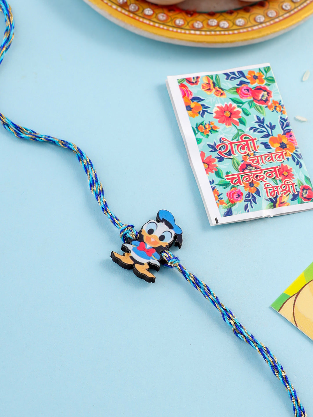 NVR Stylish Blue Cartoon Character Kids Rakhi with Roli Chawal Chandan & Mishri - Distacart