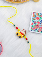 Thumbnail for NVR Kids Yellow Cartoon Artificial Beads Rakhi with Roli Chawal Chandan & Mishri