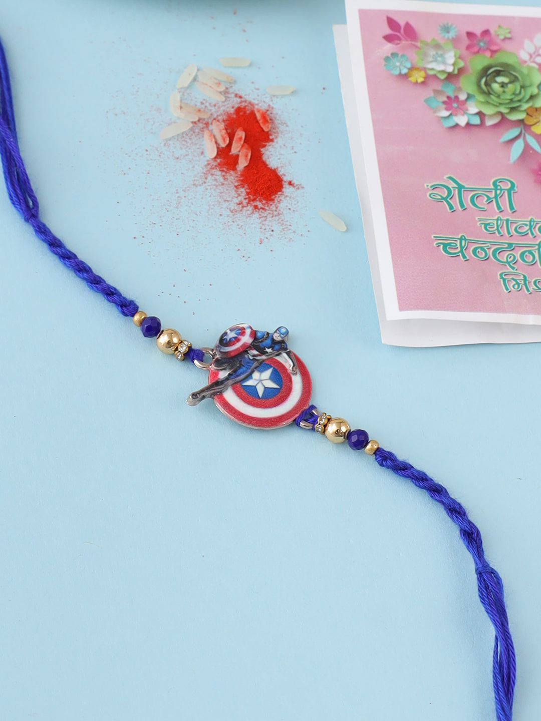 NVR Kids Superhero Blue Artificial Beads Thread Rakhi with Roli Chawal Chandan & Mishri - Distacart