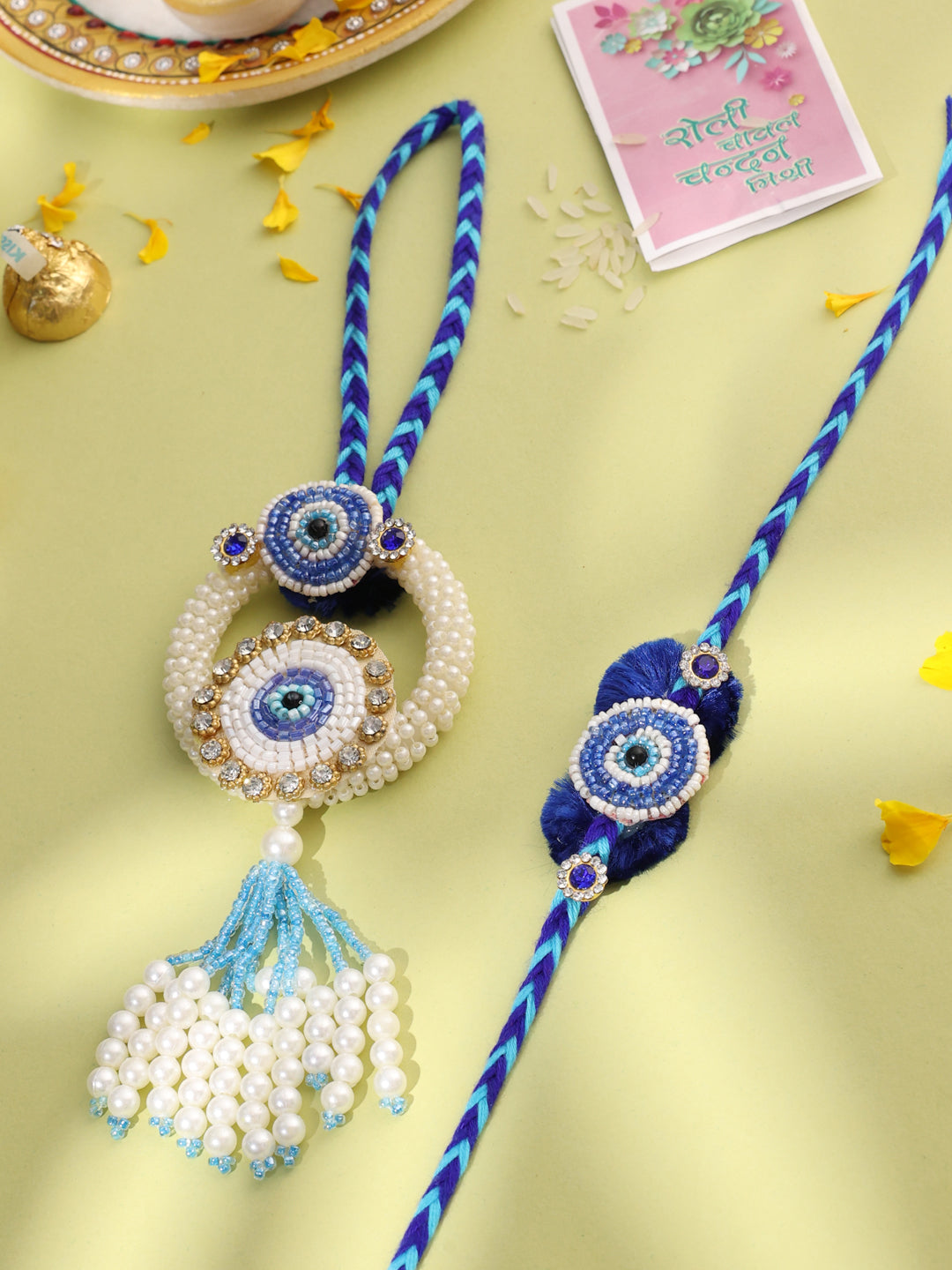 NVR Set of 2 Blue Evil Eye Artificial Stones & Pearls Bhaiya Bhabhi Rakhi with Roli Chawal Chandan & Mishri - Distacart