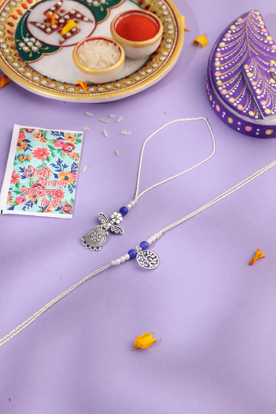 NVR Set of 2 Silver Toned Pearls & Beads Bhaiya Bhabhi Rakhi with Roli Chawal Chandan & Mishri - Distacart