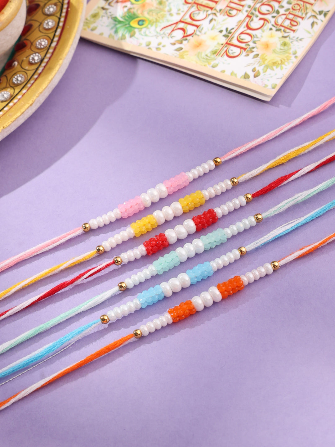 NVR Men Set of 6 Multicolor Pearls Thread Rakhi with Roli Chawal Chandan & Mishri - Distacart