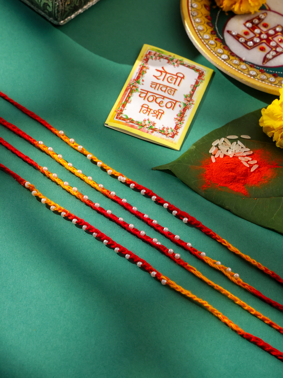 NVR Men Set of 4 Pearls Traditional Red Thread Rakhi with Roli Chawal Chandan & Mishri - Distacart