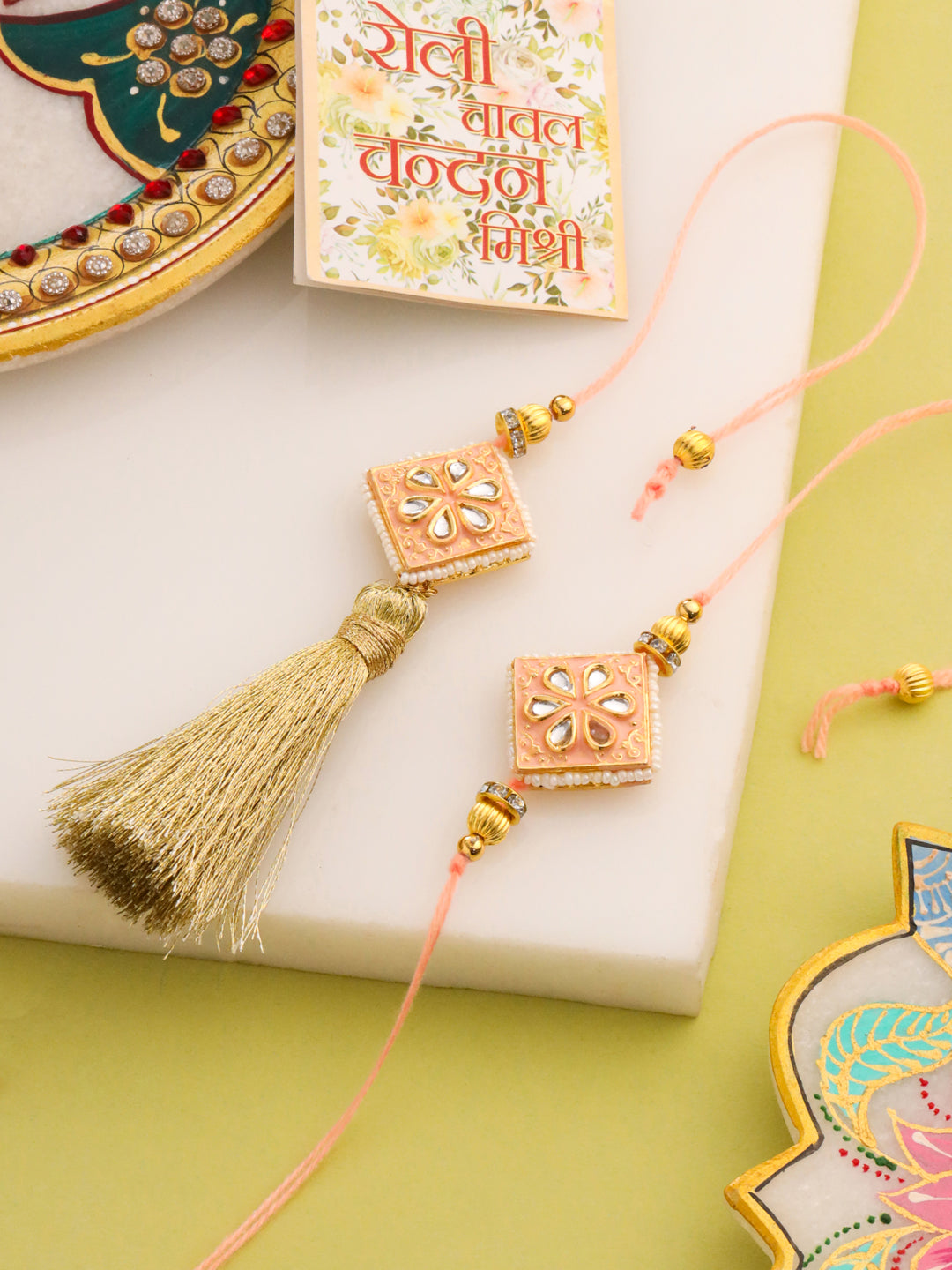 NVR Set of 2 Handmade Peach Kundan Studded Bhaiya Bhabhi Rakhi Set with Roli Chawal Chandan & Mishri