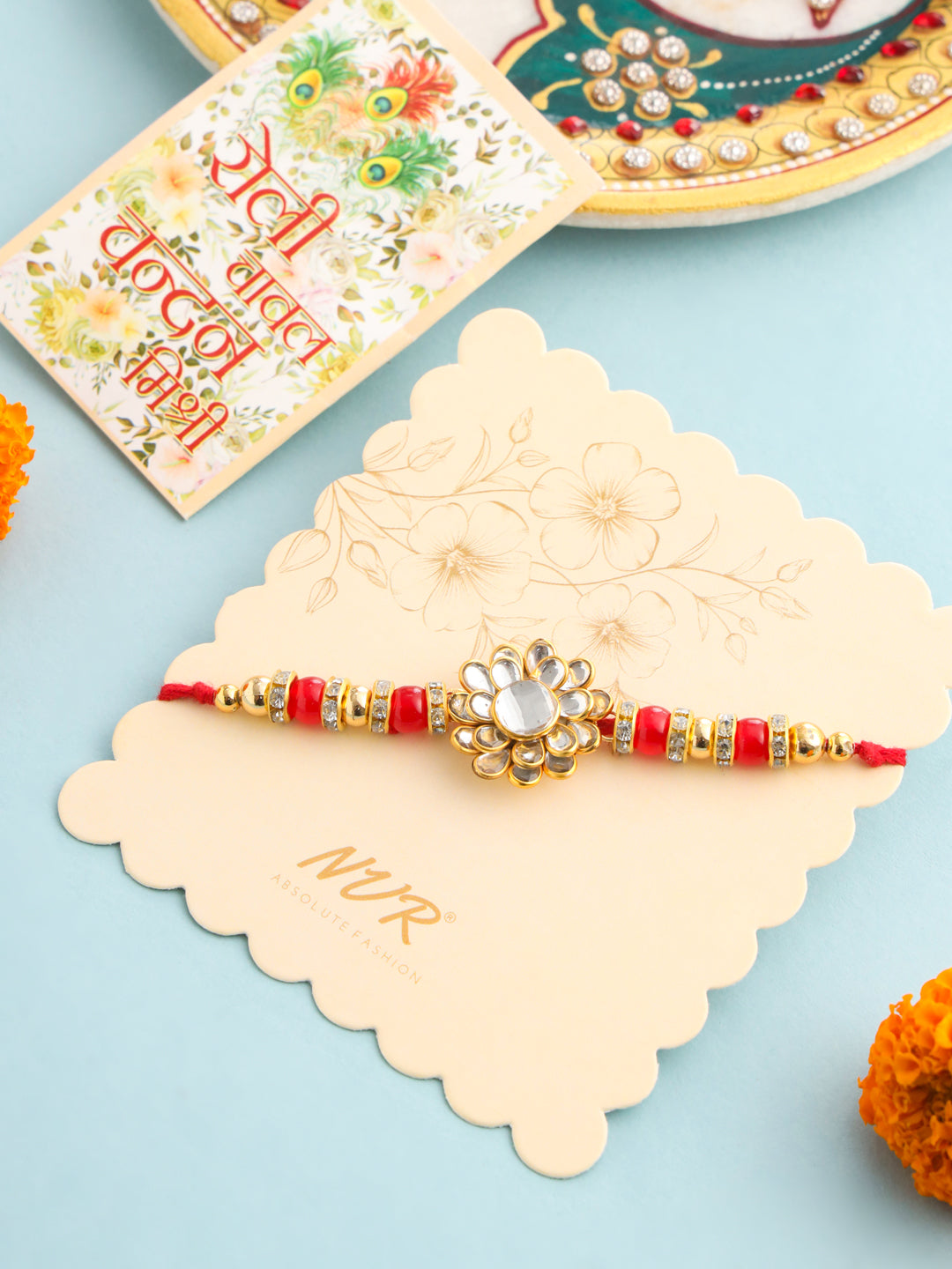 NVR Men Red Kundan Studded Floral Design Thread Rakhi with Roli Chawal Chandan & Mishri - Distacart