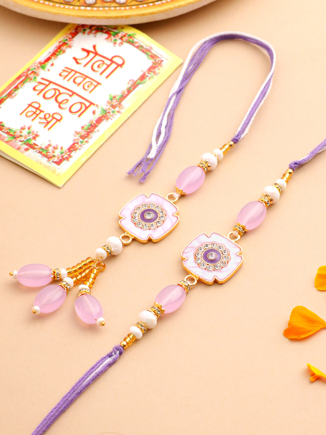 NVR Set of 2 Purple Artificial Stones & Beads Floral Design Thread Bhaiya Bhabhi Rakhi with Roli Chawal Chandan & Mishri