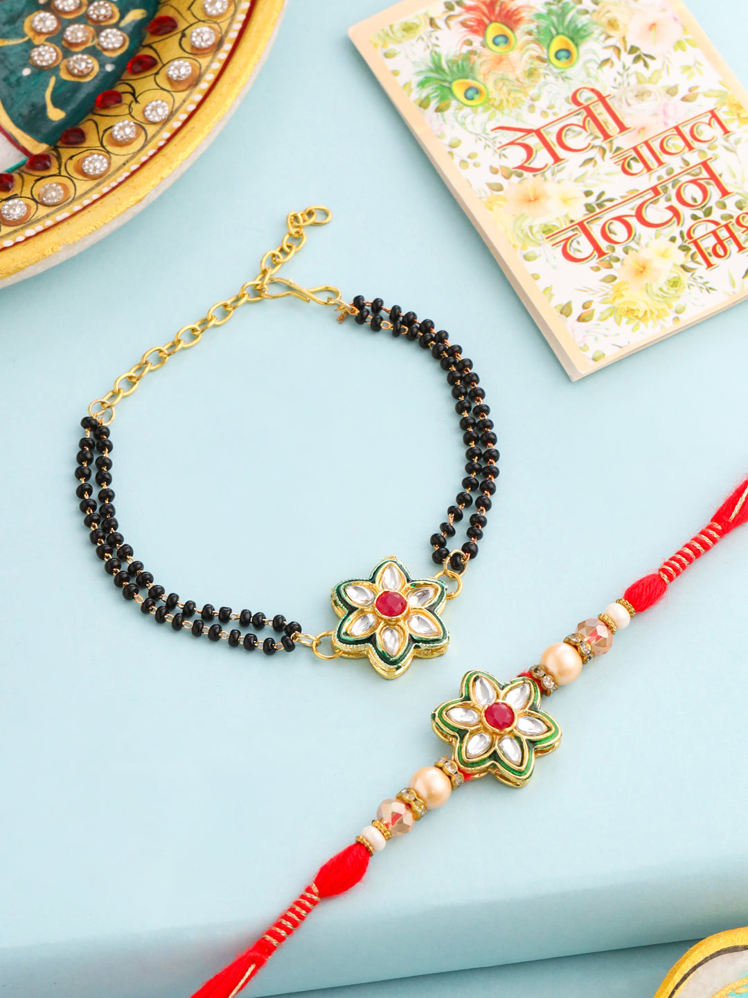 NVR Set of 2 Gold Toned Kundan Studded Floral Shape Bhaiya Bhabhi Rakhi with Roli Chawal Chandan & Mishri - Distacart