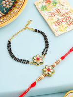 Thumbnail for NVR Set of 2 Gold Toned Kundan Studded Floral Shape Bhaiya Bhabhi Rakhi with Roli Chawal Chandan & Mishri