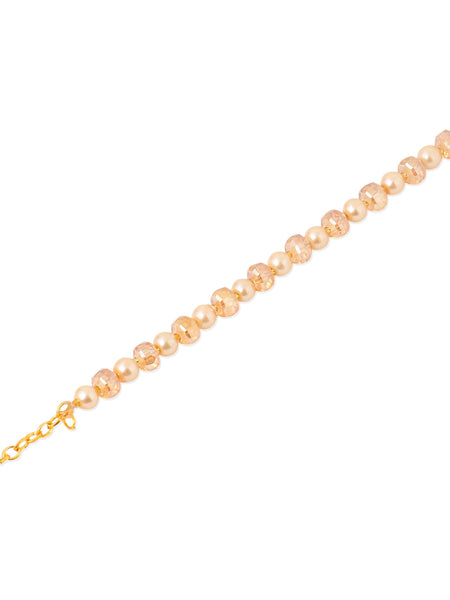 NVR Women Gold Toned Artificial Beads Wraparound Rakhi with Roli Chawal Chandan & Mishri