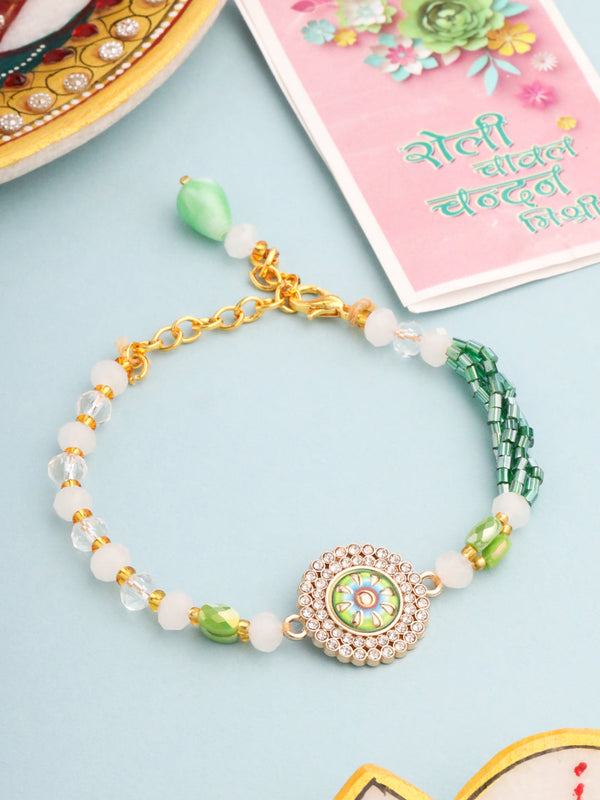 NVR Women Green Artificial Stones & Beads Floral Wraparound Rakhi with Roli Chawal Chandan & Mishri
