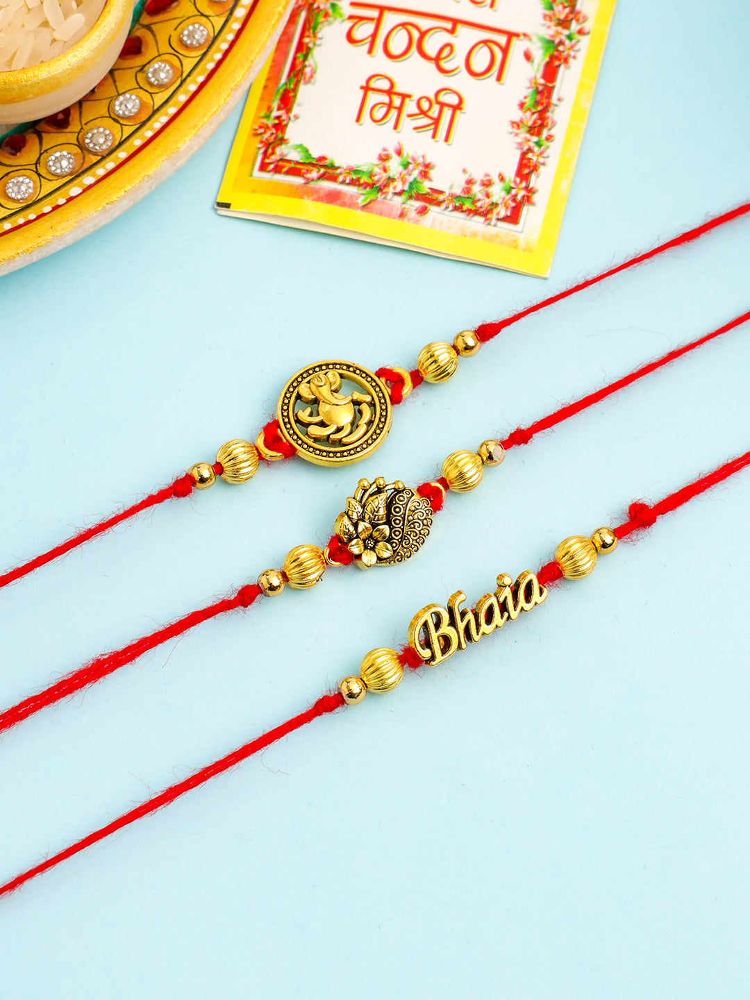 NVR Men Set of 3 Gold Toned Thread Rakhi with Roli Chawal Chandan & Mishri - Distacart