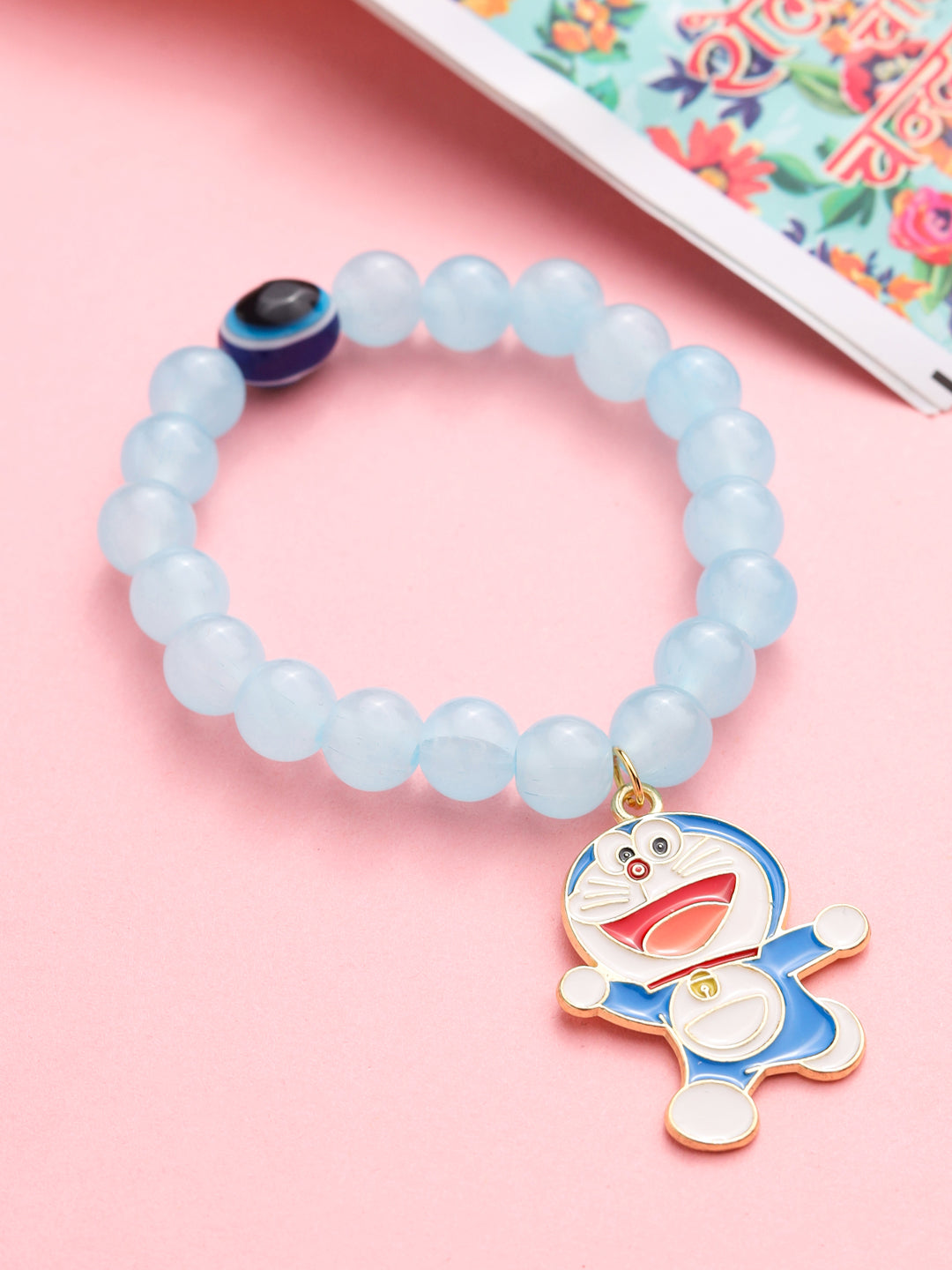 NVR Kids Cartoon Design Sky BLue Artificial Beads Thread Rakhi with Roli Chawal Chandan & Mishri - Distacart