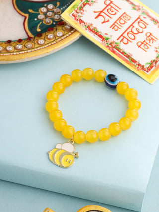 NVR Kids Cartoon Design Yellow Artificial Beads Thread Rakhi with Roli Chawal Chandan & Mishri