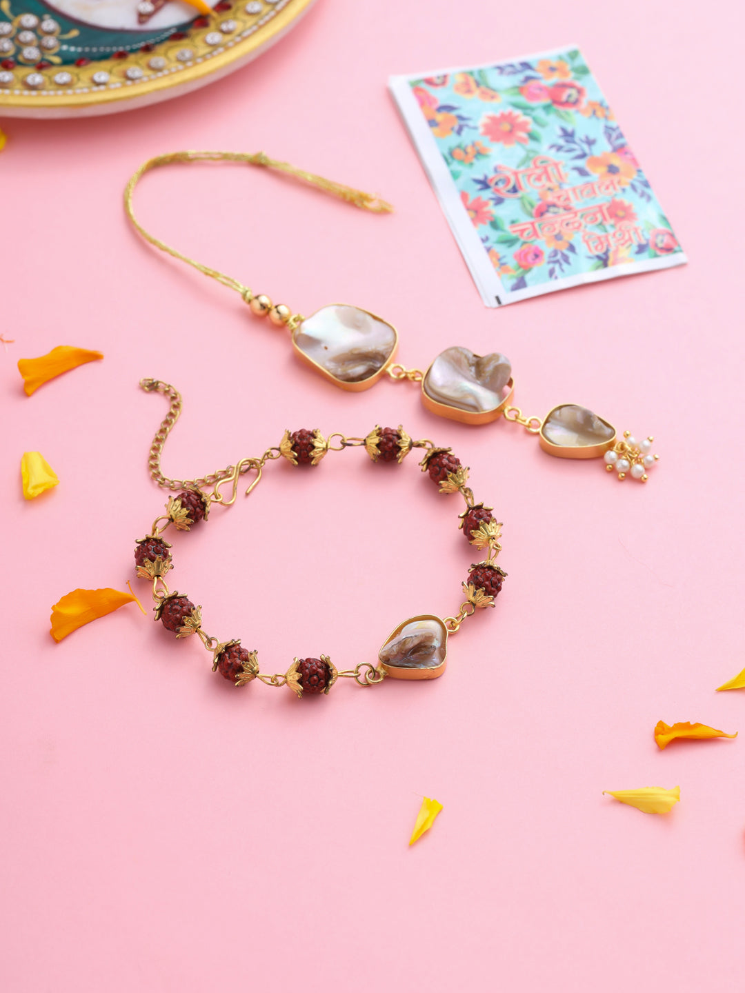 NVR Set of 2 Gold Toned Rudraksh & Pearls Bhaiya Bhabhi Rakhi with Roli Chawal Chandan & Mishri - Distacart