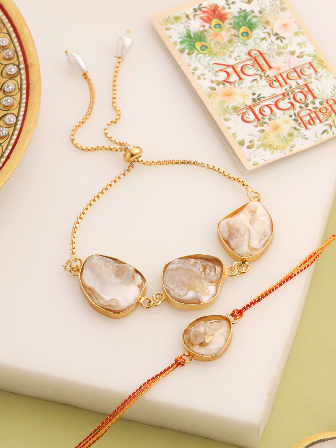 NVR Set of 2 Gold Toned Pearls Bhaiya Bhabhi Rakhi with Roli Chawal Chandan & Mishri - Distacart