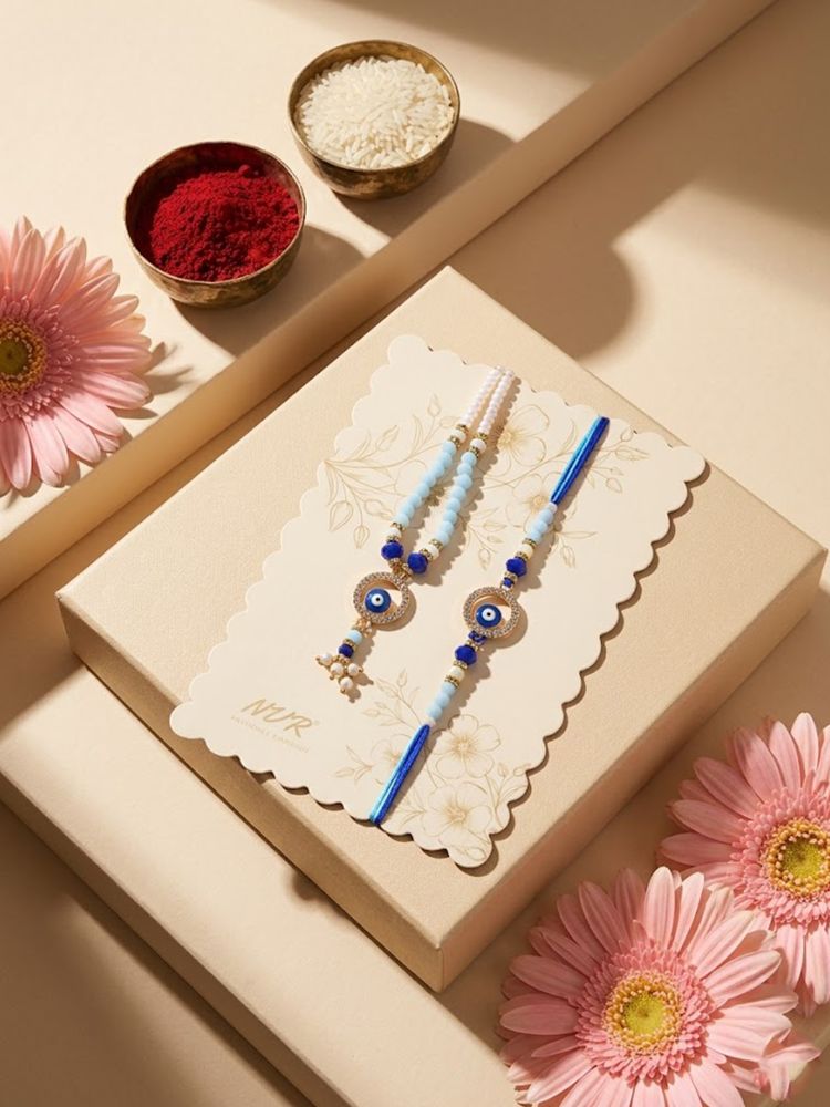 NVR Set of 2 Blue Evil Eye Gold Toned Beaded Bhaiya Bhabhi Rakhi with Roli Chawal Chandan - Dista